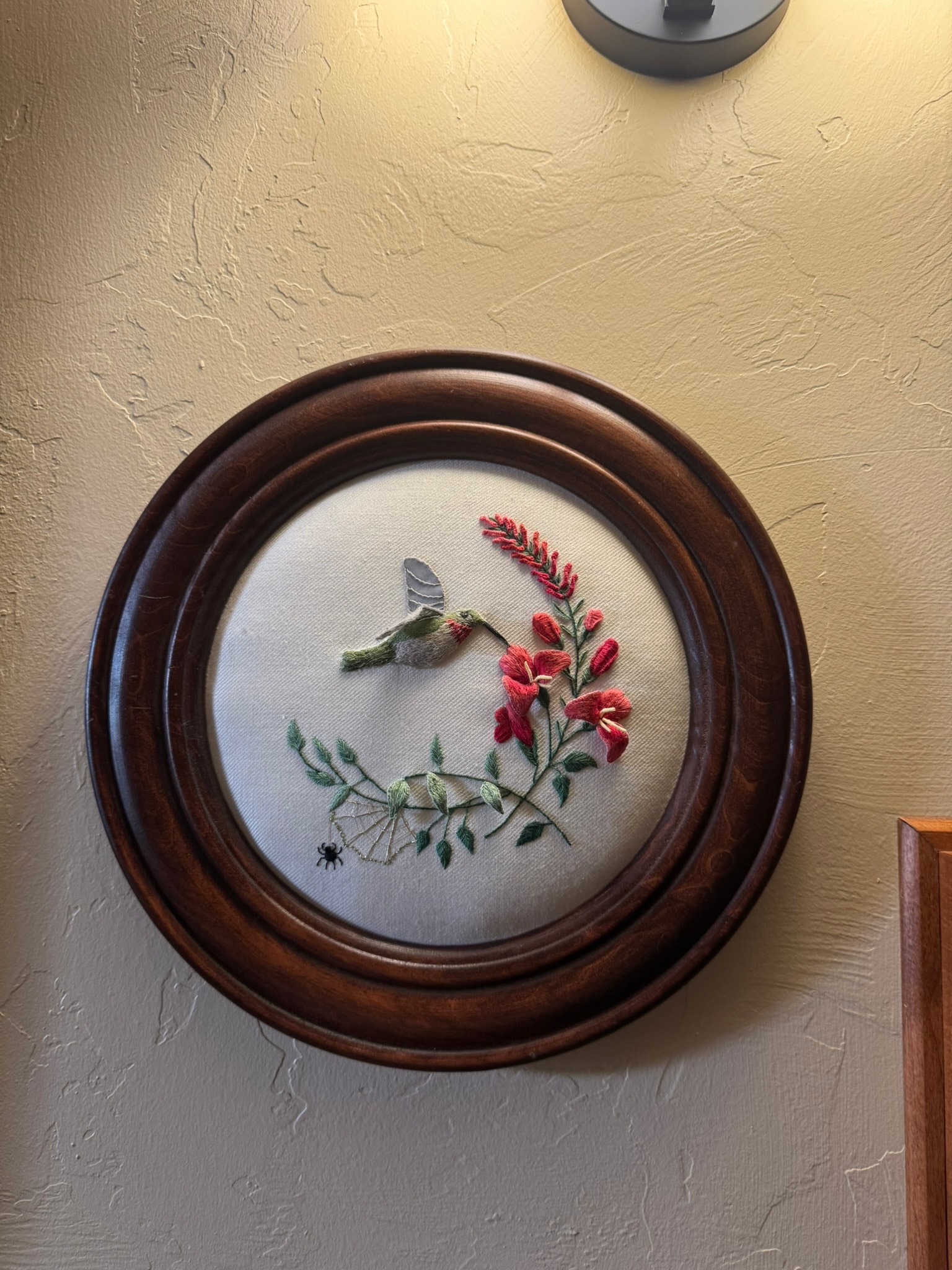 Hummingbird with red flowers